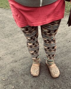 Me wearing my pattern leggings, woollen socks and crocs.